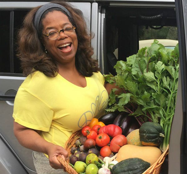 Oprah Winfrey Holding Fruit