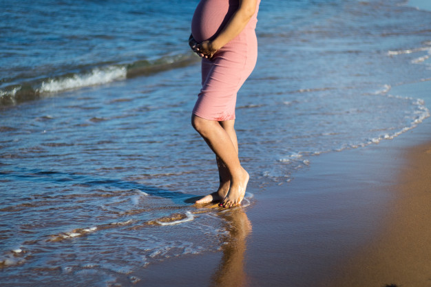 Image result for pregnant belly beach