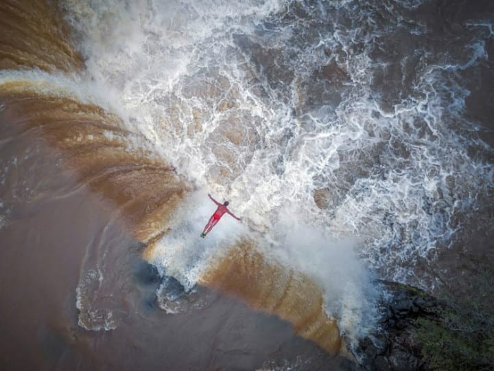 drone photo - waterfall diver